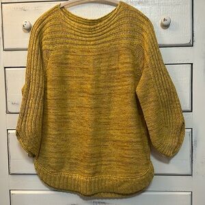 Dressy sweater, hangs well, very flattering on!